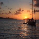 Sailing yacht Chao Lay at sunset in Grenada and the Grenadines.
