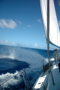 Sailing yacht heeling over with students learning to sail in Grenada.
