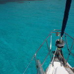 Picking up a mooring buoy under sail in the Tobago Cays.